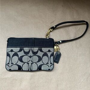 Coach Black and Grey Signature Monogram Small Wristlet. 6” by 4”
